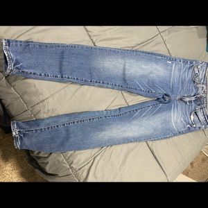 AE Less Distressed Skinny Jeans